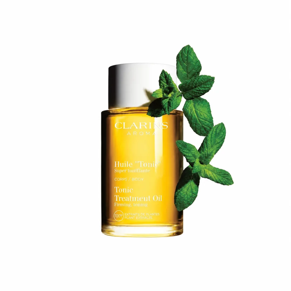 Clarins Tonic Treatment Oil bottle with mint leaves